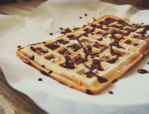 showing of waffle with chocolate syrup thumbnail