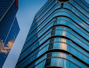 glass building under blue sky during day time thumbnail