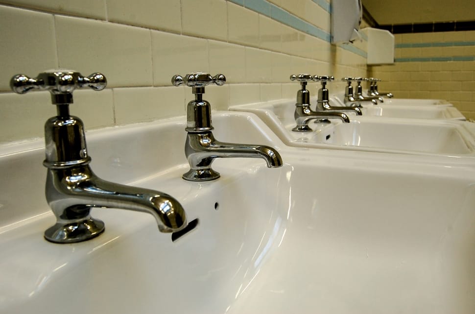 white ceramic sinks with stainless steel faucets preview