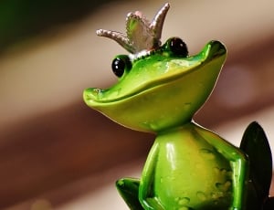 green ceramic frog figurine thumbnail