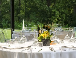 table setting and yellow lily centerpiece thumbnail