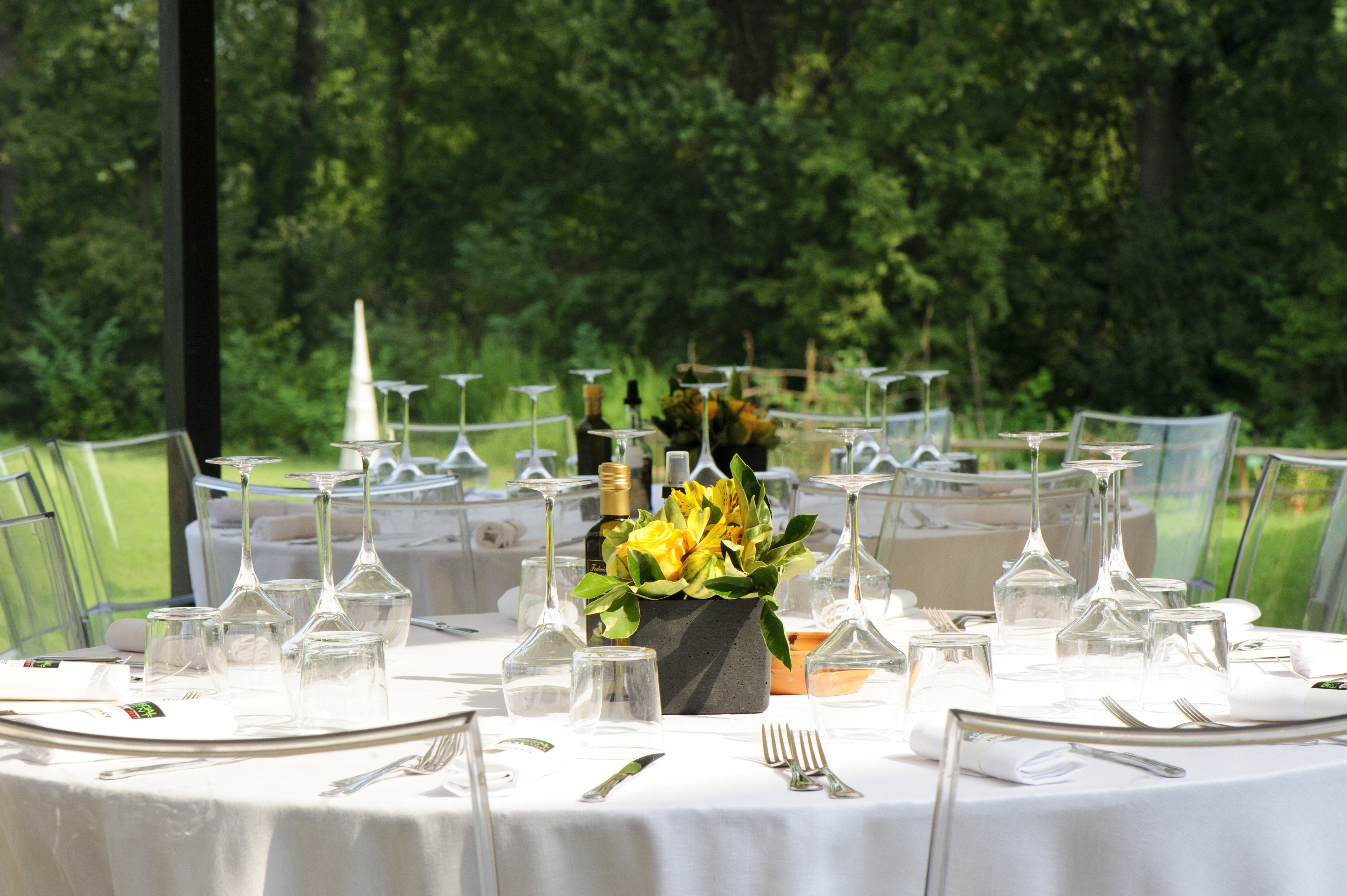 table setting and yellow lily centerpiece