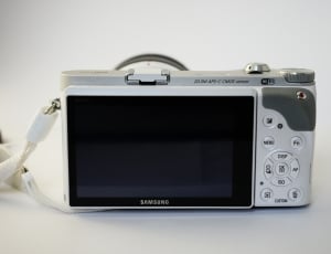 gray and white samsung digital camera thumbnail