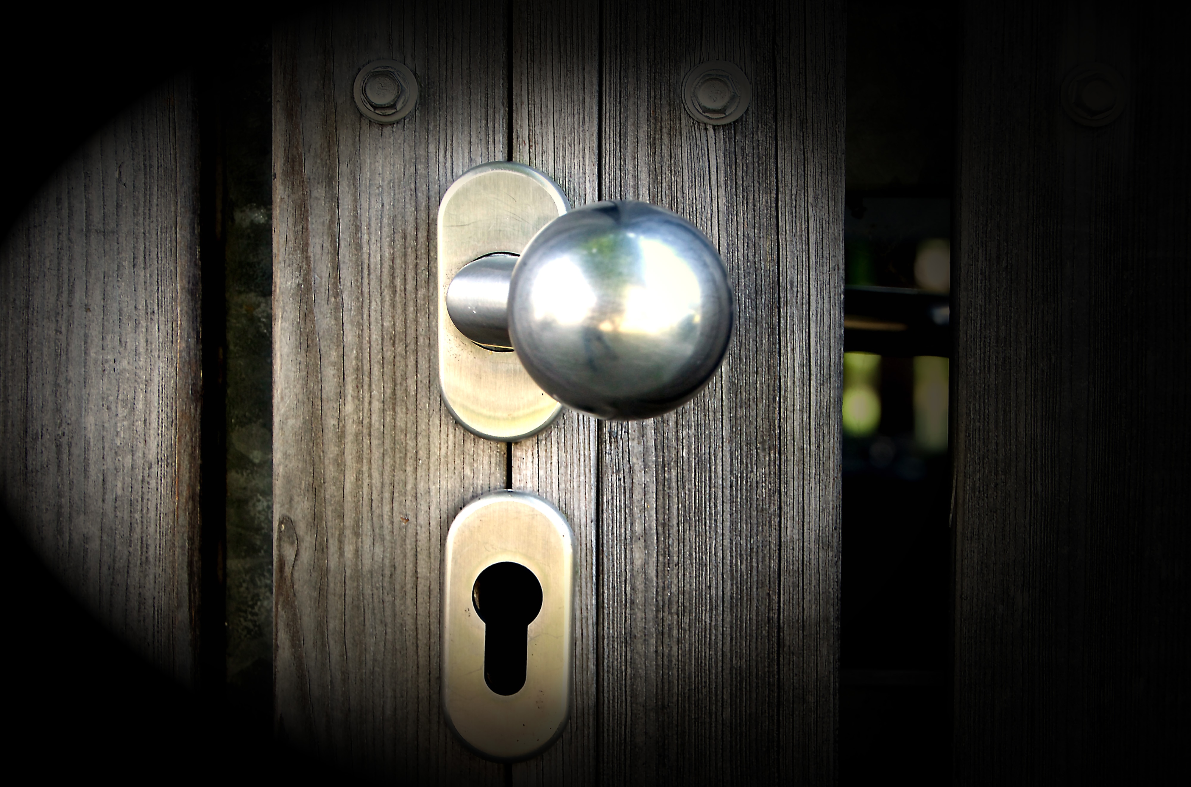 brass doorknob and keyhole