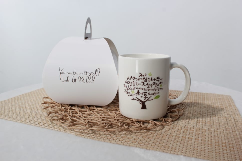 white and brown tree logo coffee mug preview