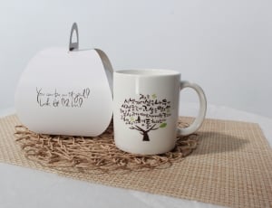 white and brown tree logo coffee mug thumbnail