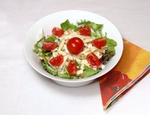 vegetable salad on white ceramic bowl thumbnail