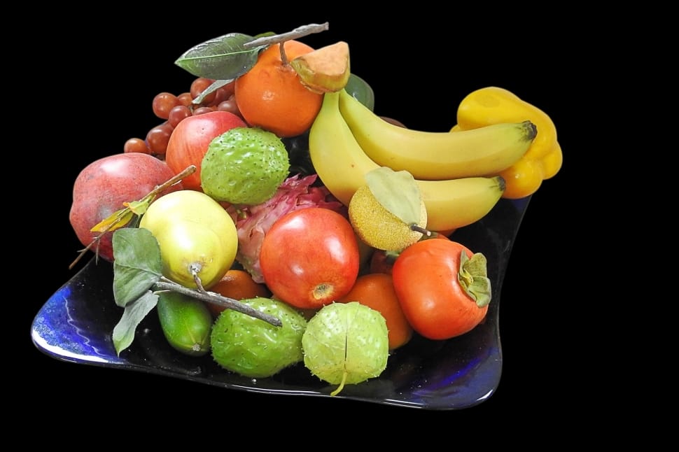 assorted fruits in black ceramic plate preview