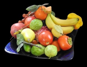 assorted fruits in black ceramic plate thumbnail