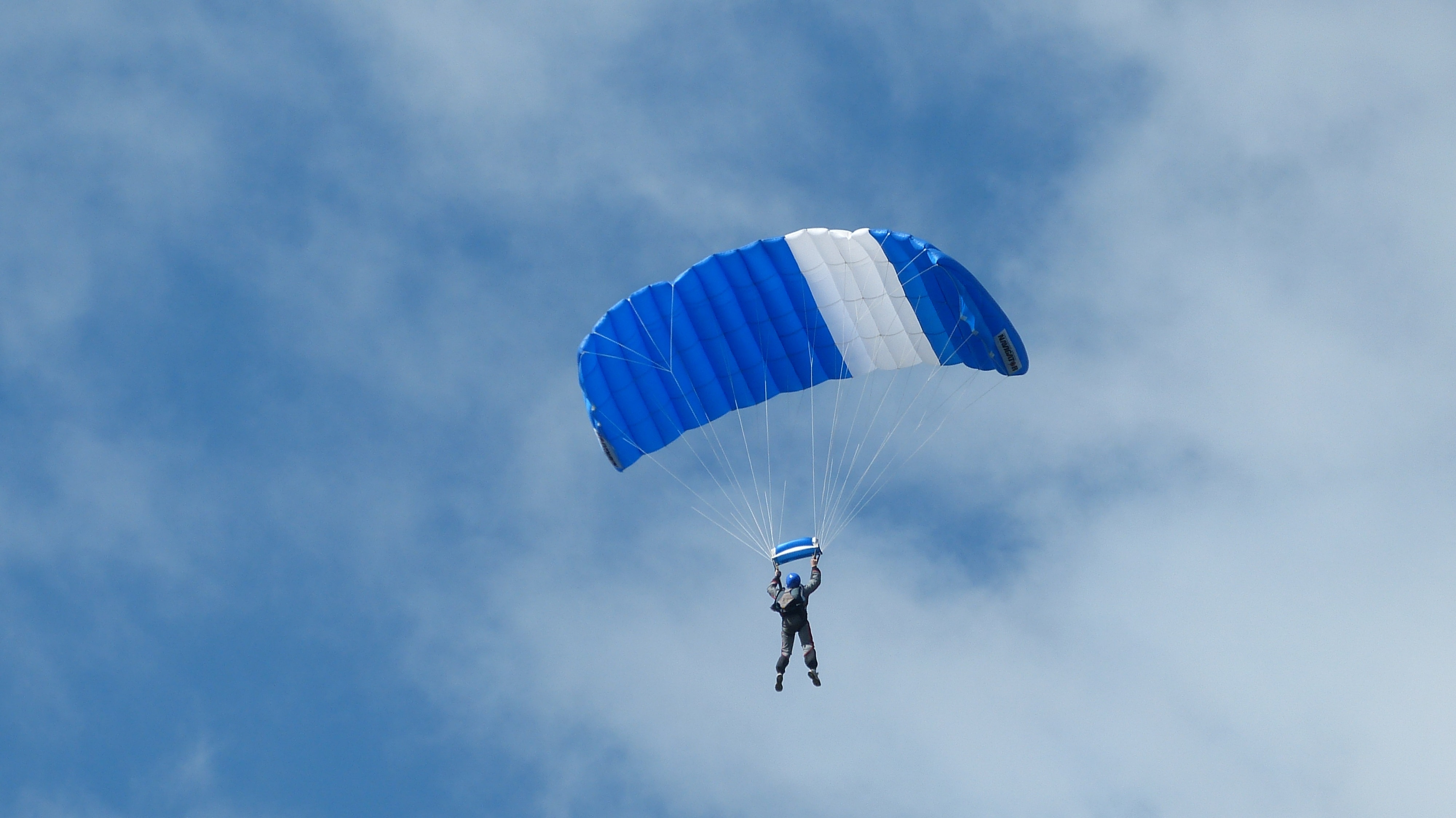 blue and white parachute