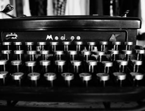 black and stainless steel typewriter thumbnail