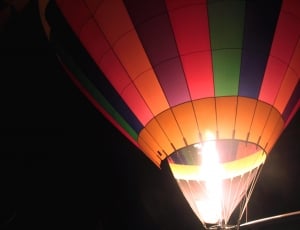 hot air ballon during night time thumbnail