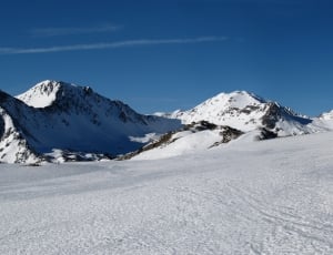 white mountain with snow during daytime thumbnail