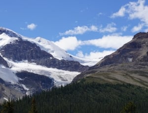 glacier mountain under blue sky thumbnail