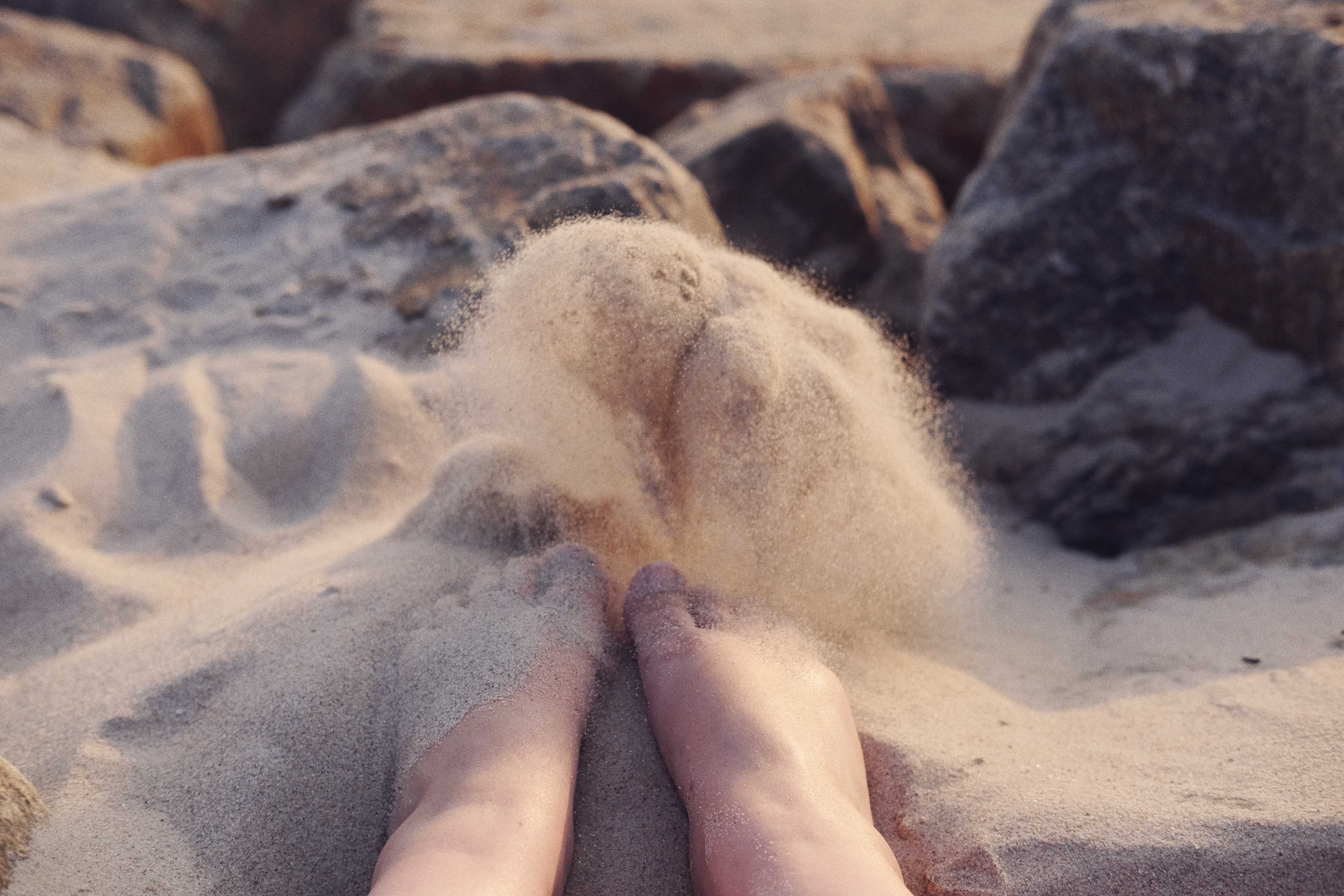 human feet on sand