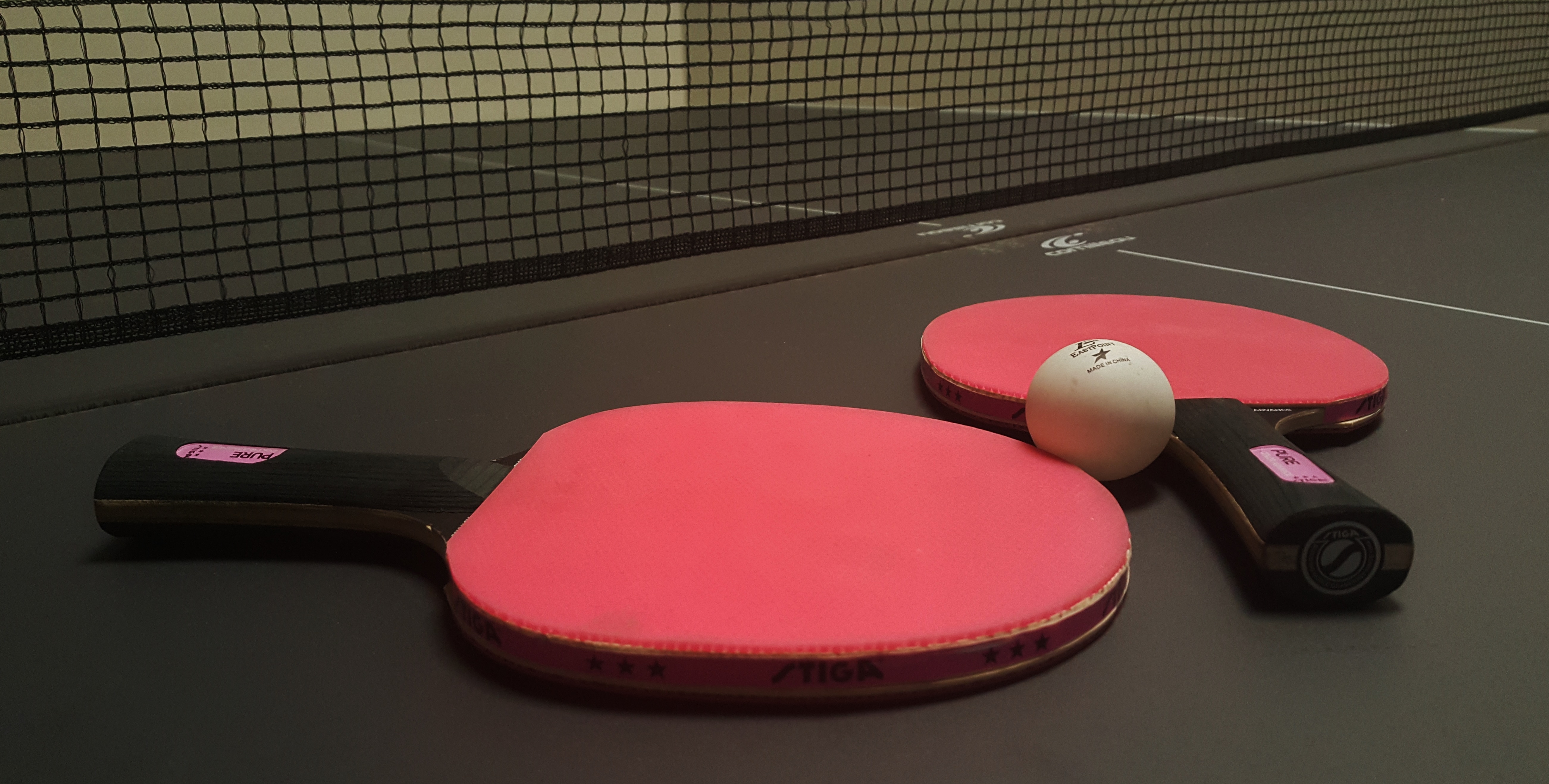 red and black table tennis set