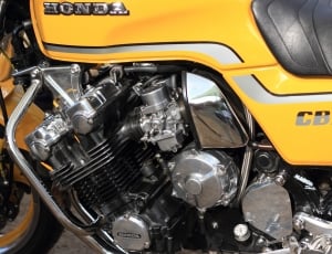 yellow and black Honda naked motorcycle thumbnail