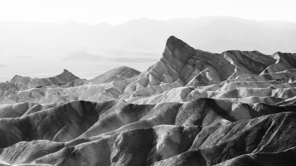 grayscale photography of mountains preview