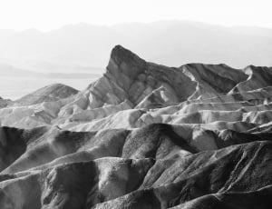 grayscale photography of mountains thumbnail