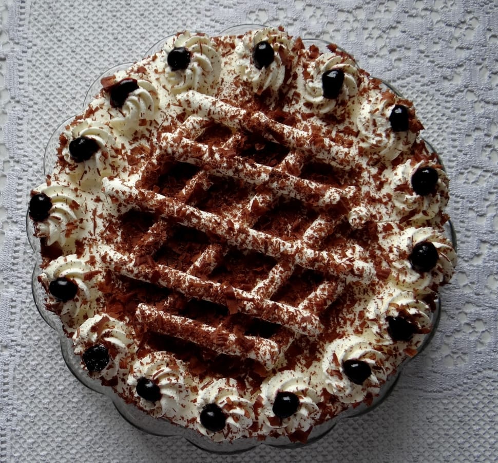vanilla frosting cake with berries and chocolate crumbles preview