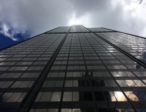 grey high rise buildings under white sky thumbnail