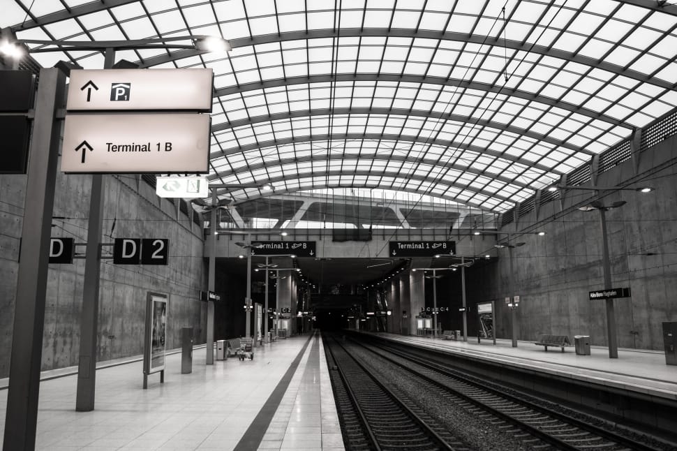 gray scale photo of train station preview
