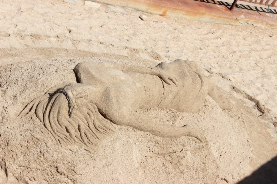 woman sand artwork preview