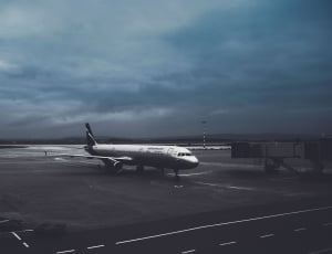 white and black commercial airplane thumbnail