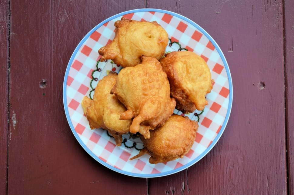 5 fried chickens on white and red ceramic round plate preview