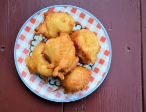 5 fried chickens on white and red ceramic round plate thumbnail