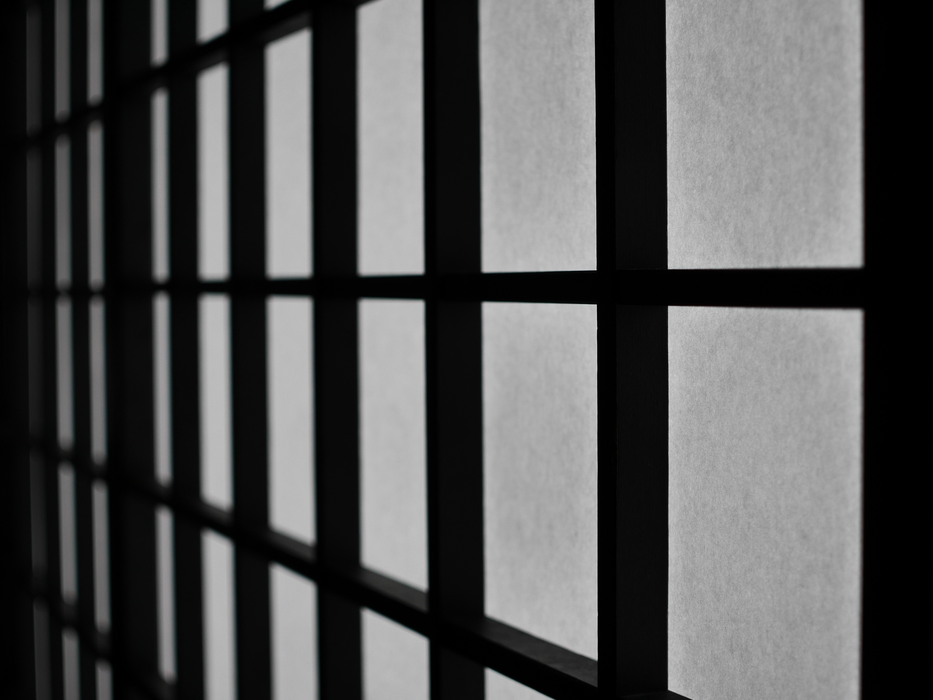 grayscale photo of cube window frame