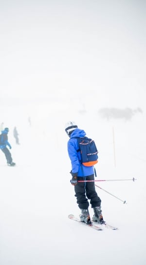 person skiing on snow during daytime thumbnail