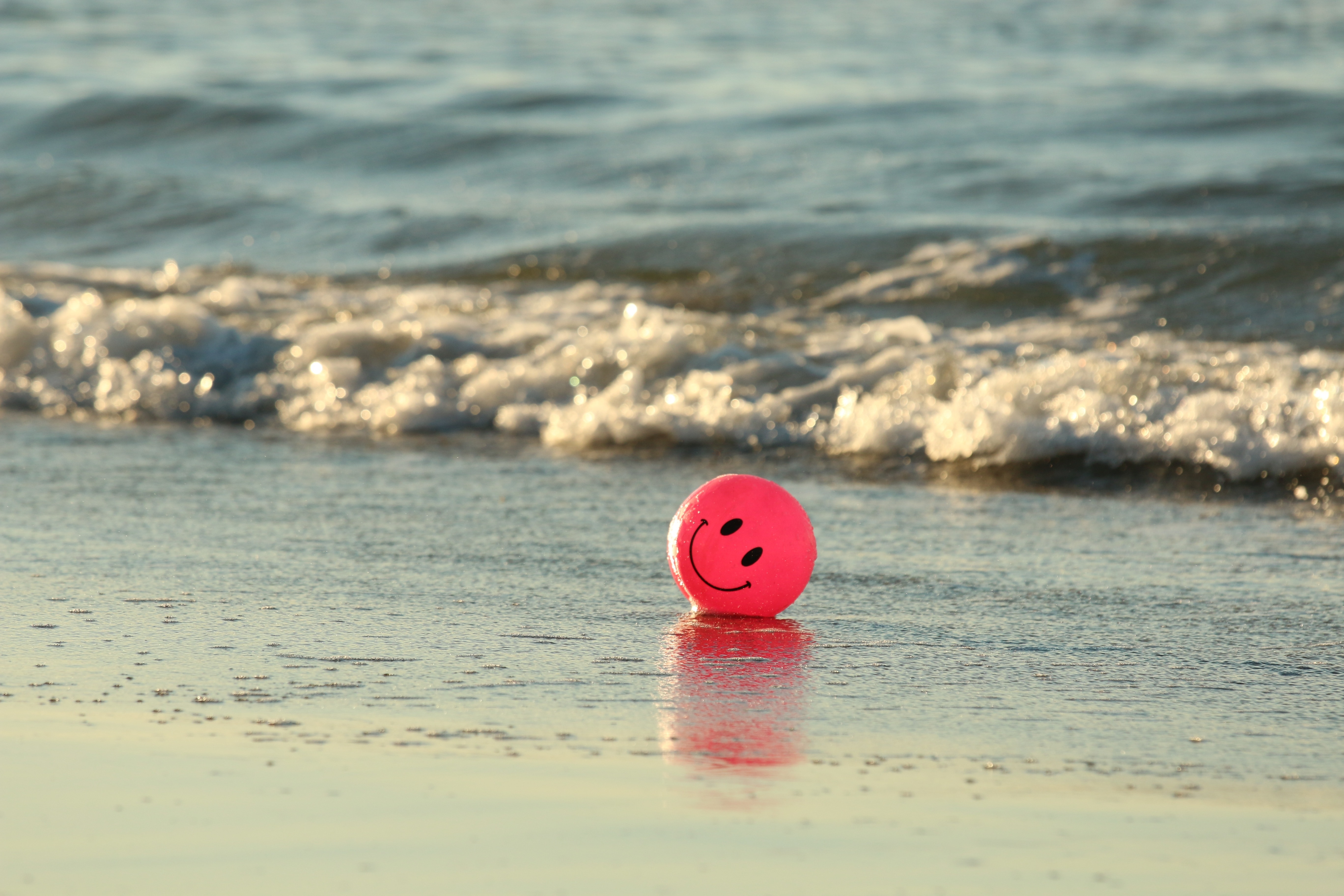 red smiley ball