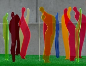 human figures plastic figurines on green surface thumbnail