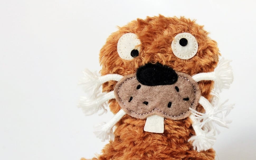 brown and white dog plush toy preview