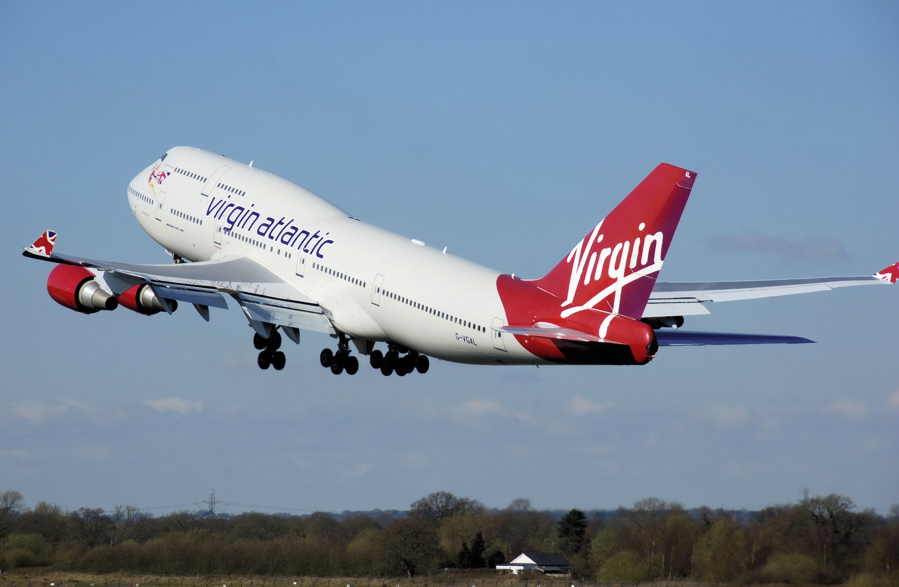 white and red virgin atlantic passenger airplane