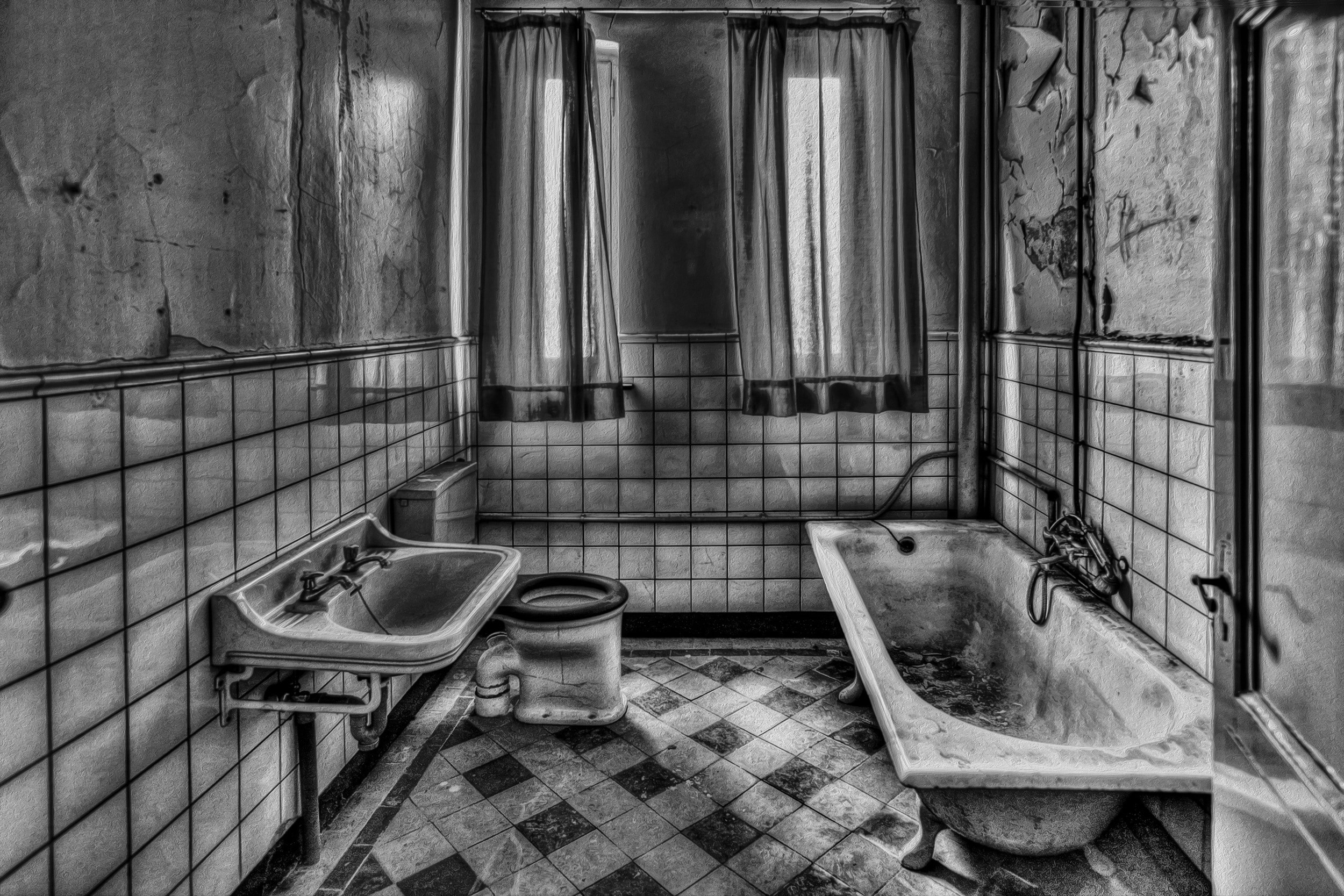 grayscale photo of toilet roomn