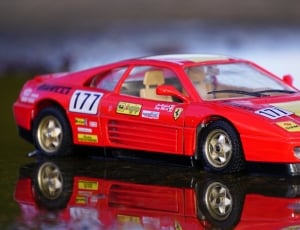 red yellow and black diecast car thumbnail
