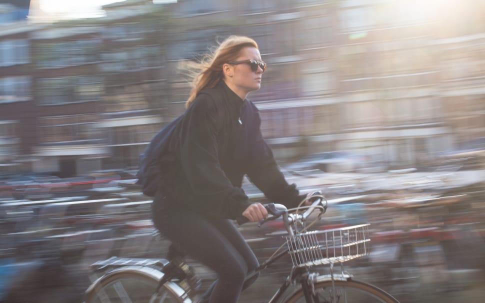 woman in black shirt riding bicycle preview