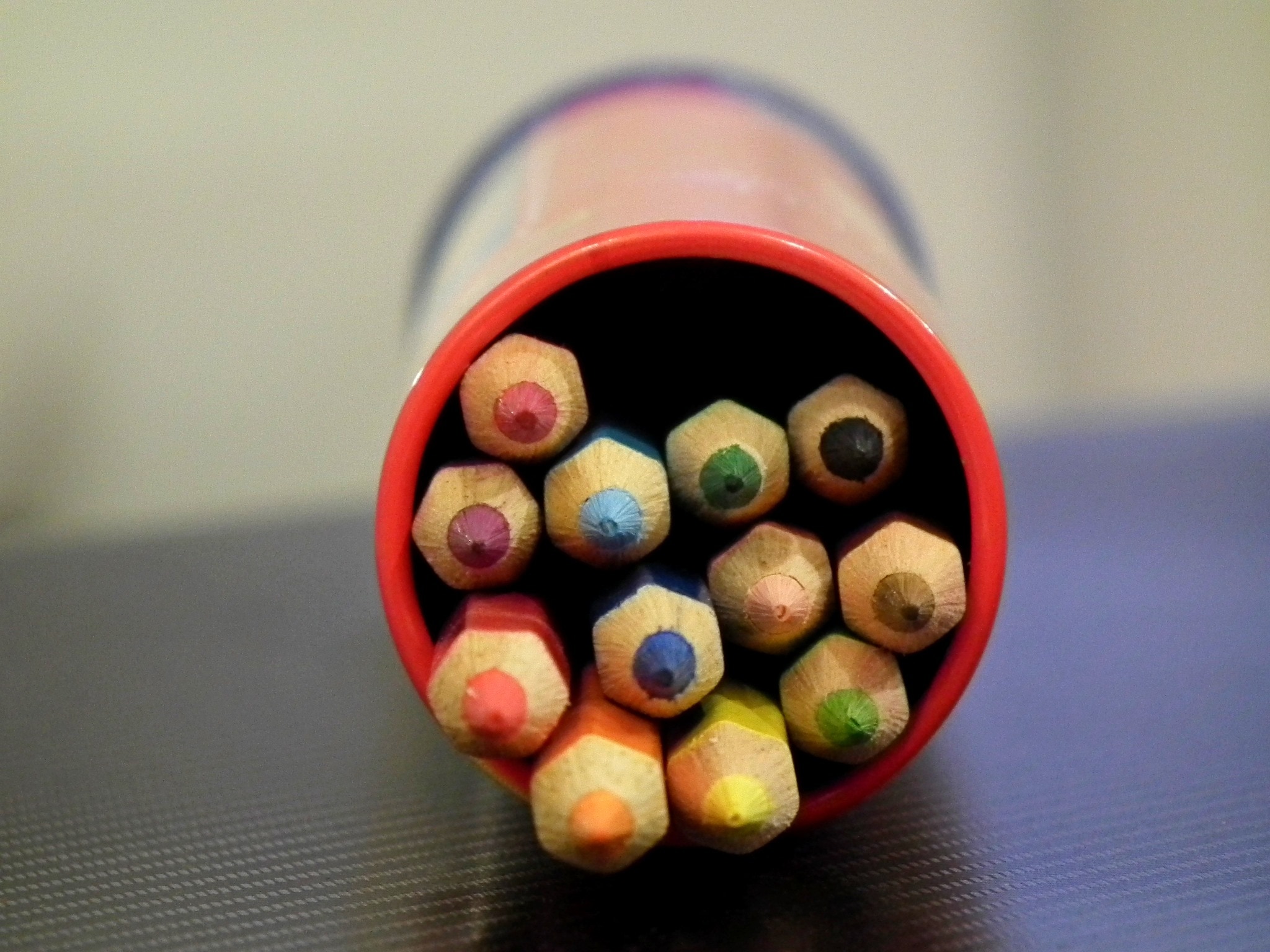 color pencils in plastic container