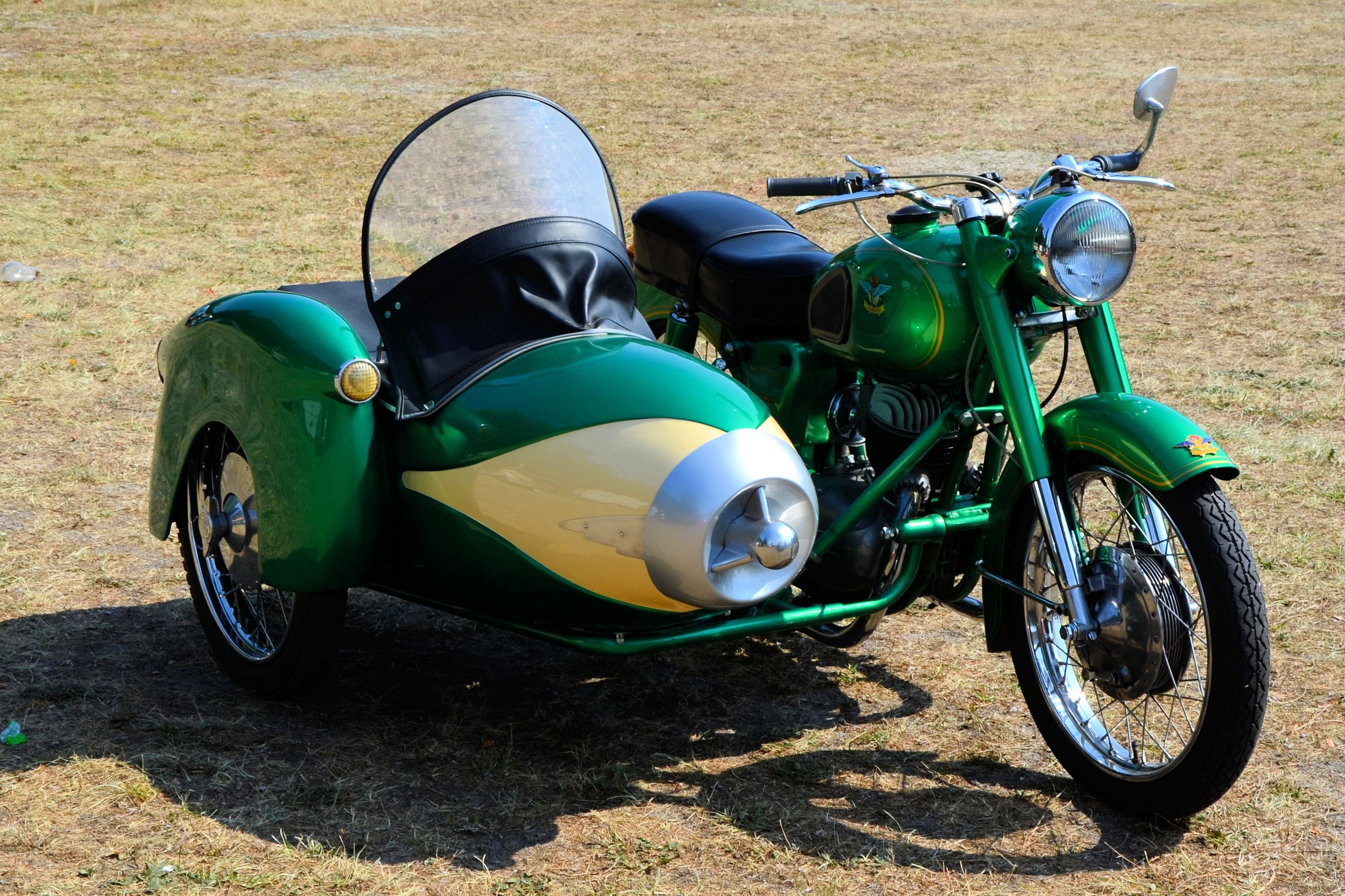 Motorcyce and Sidecar on a Cobbled Street · Free Stock Photo