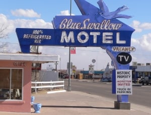 blue swallow motel vacancy tv signage thumbnail