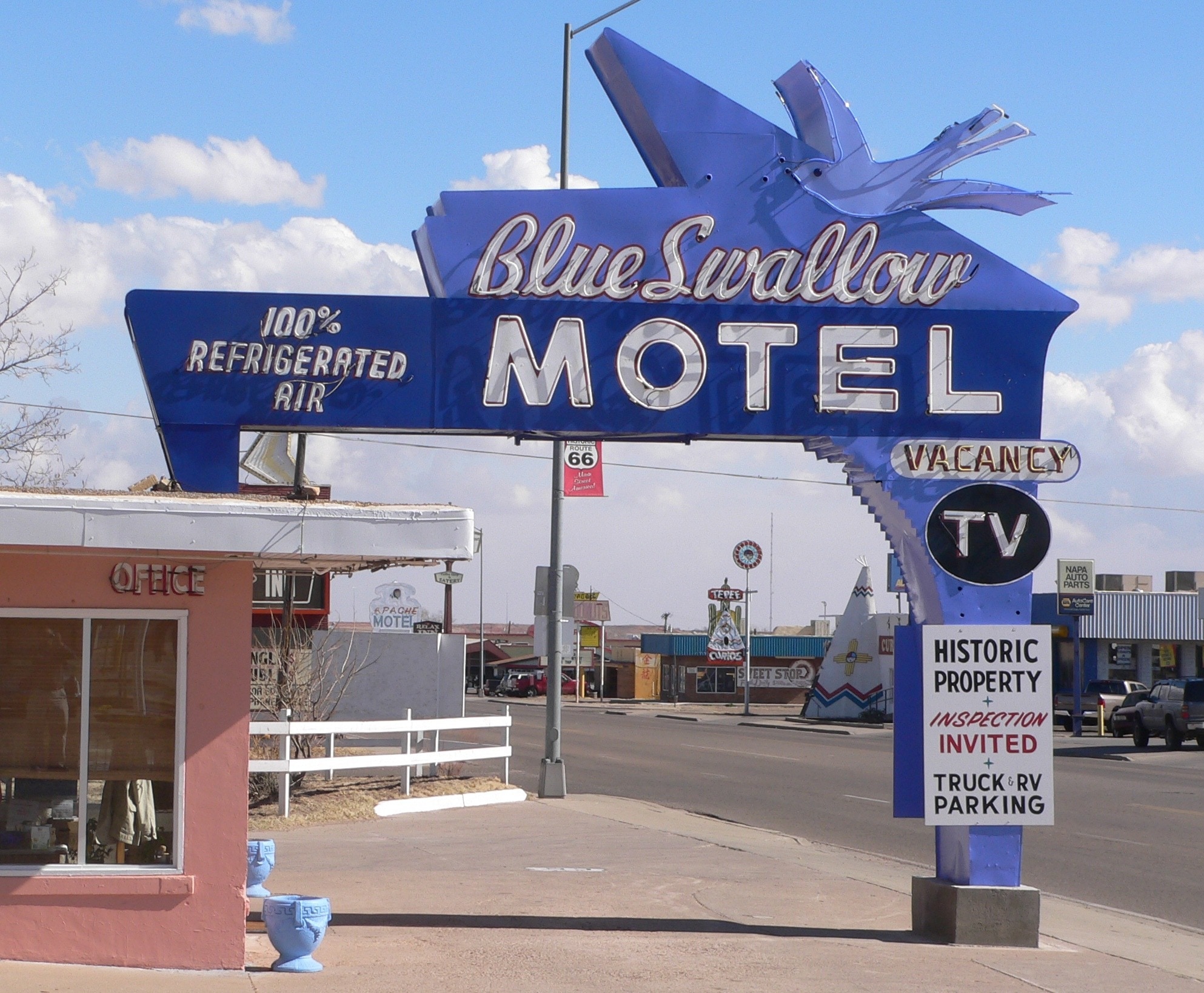 blue swallow motel vacancy tv signage