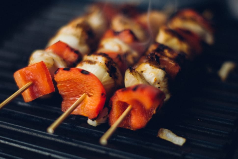 3 grilled meats with sliced vegetable on skewers preview