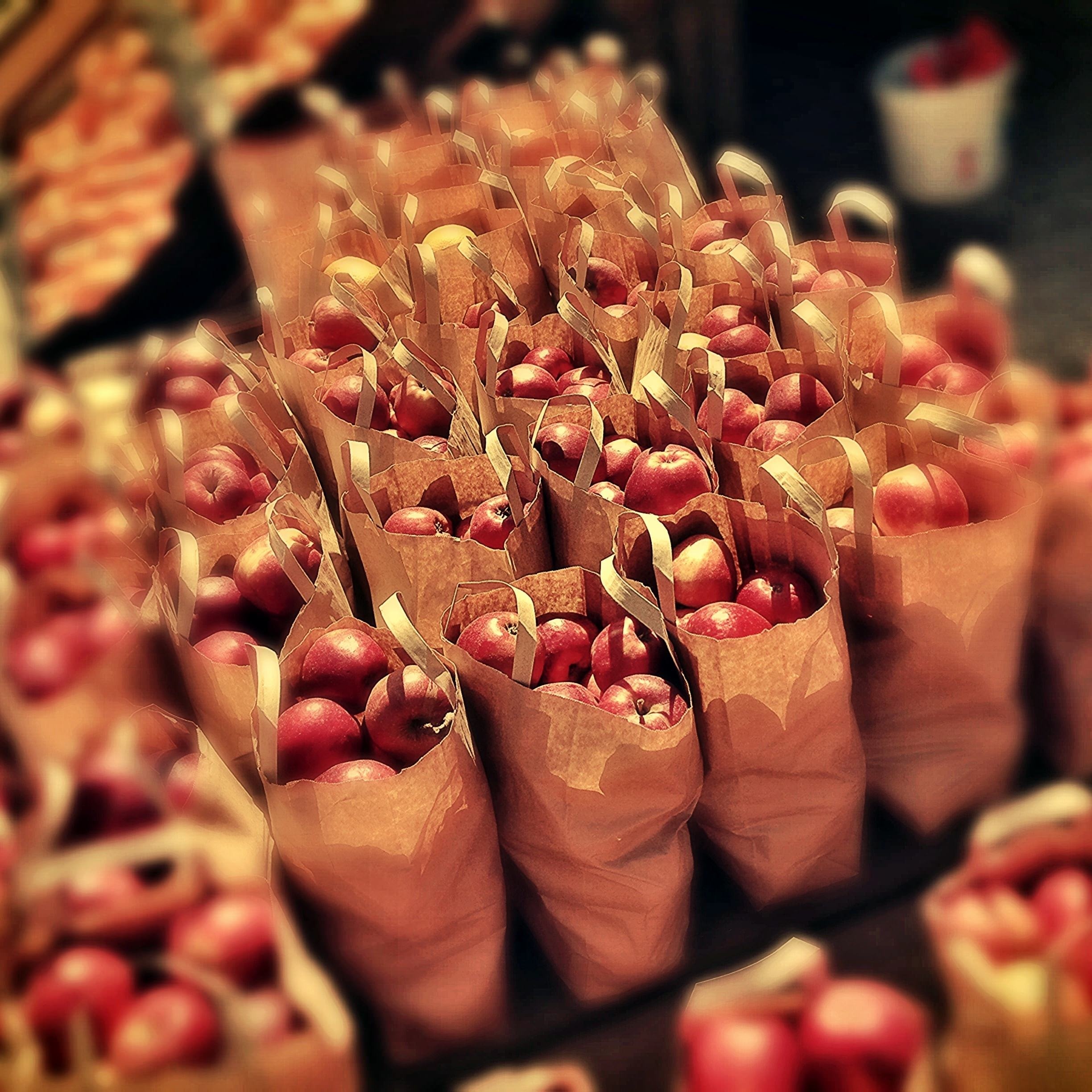 apples in brown bag