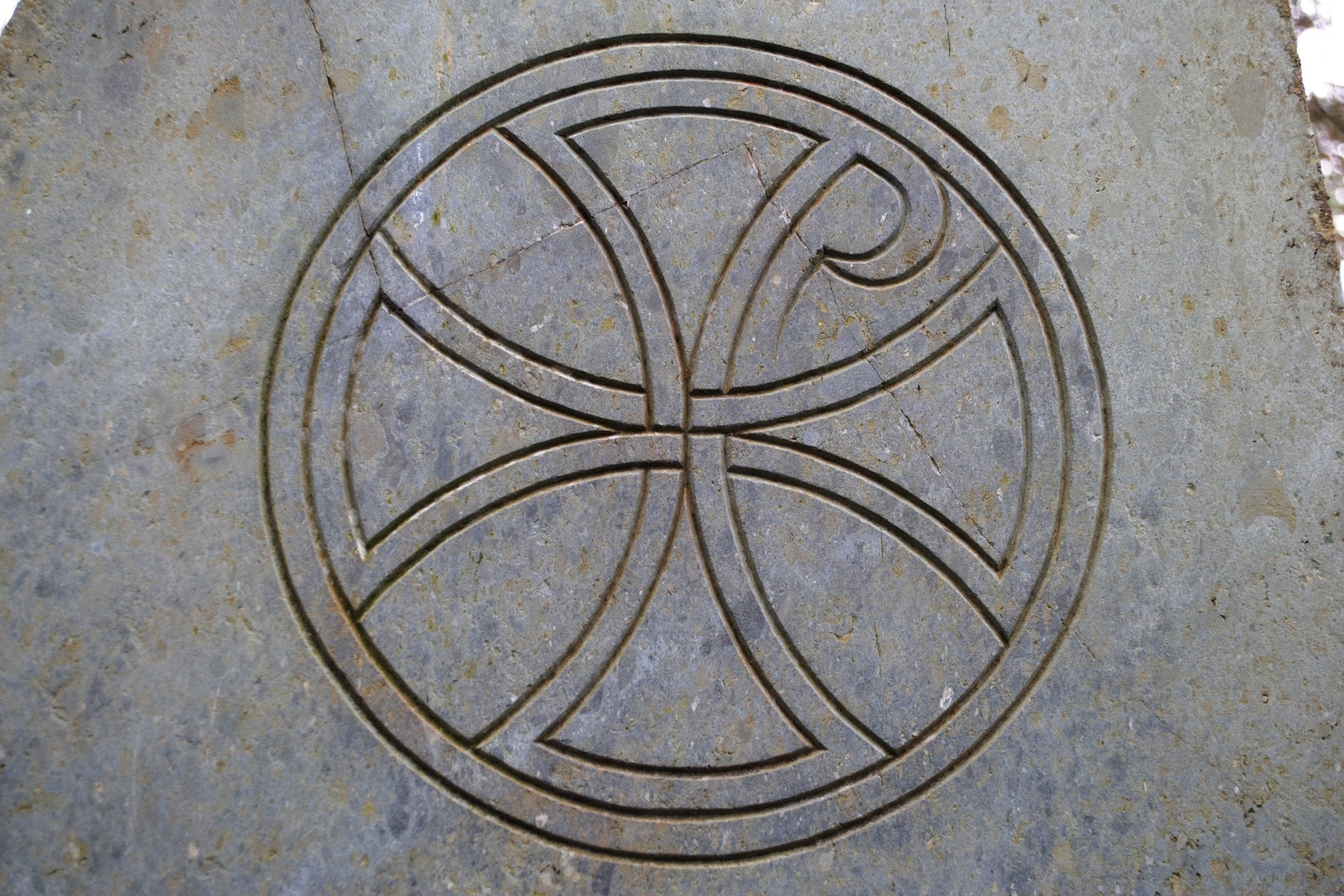 round grey cross logo