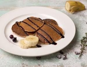 pancake with chocolate drip and banana thumbnail