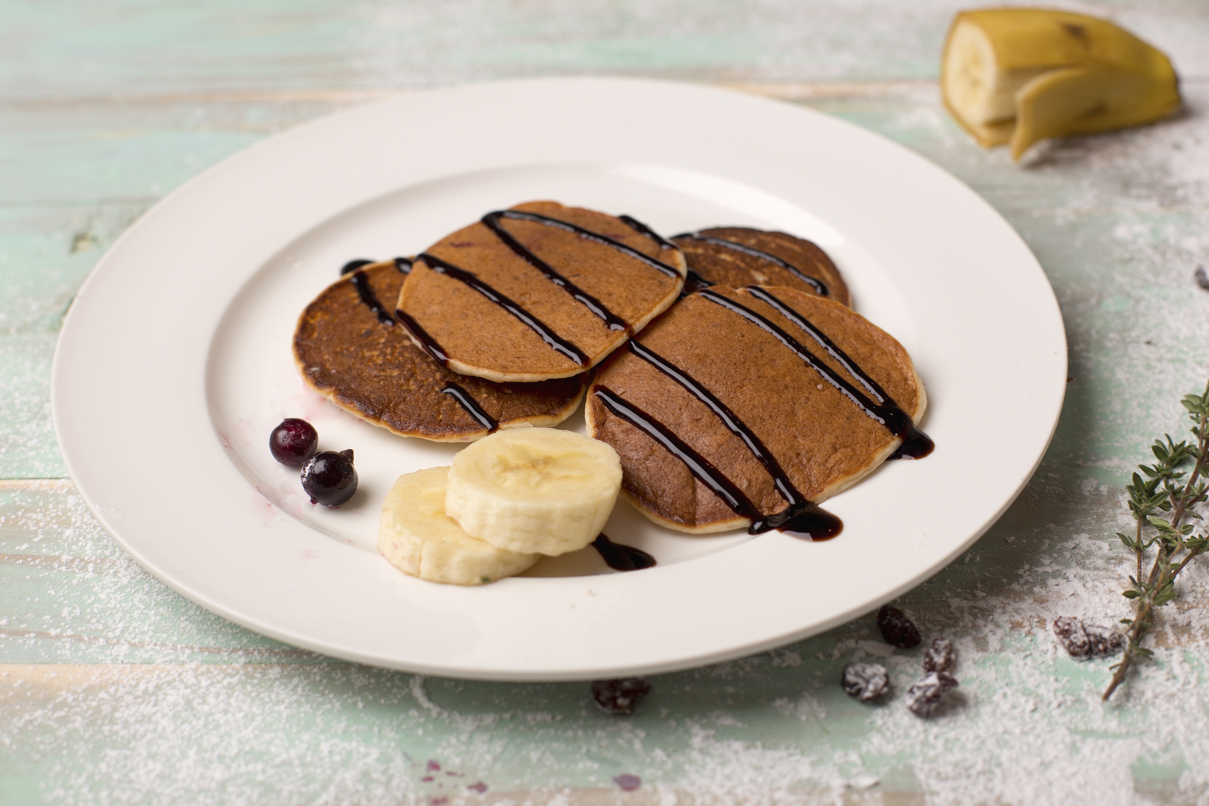 pancake with chocolate drip and banana