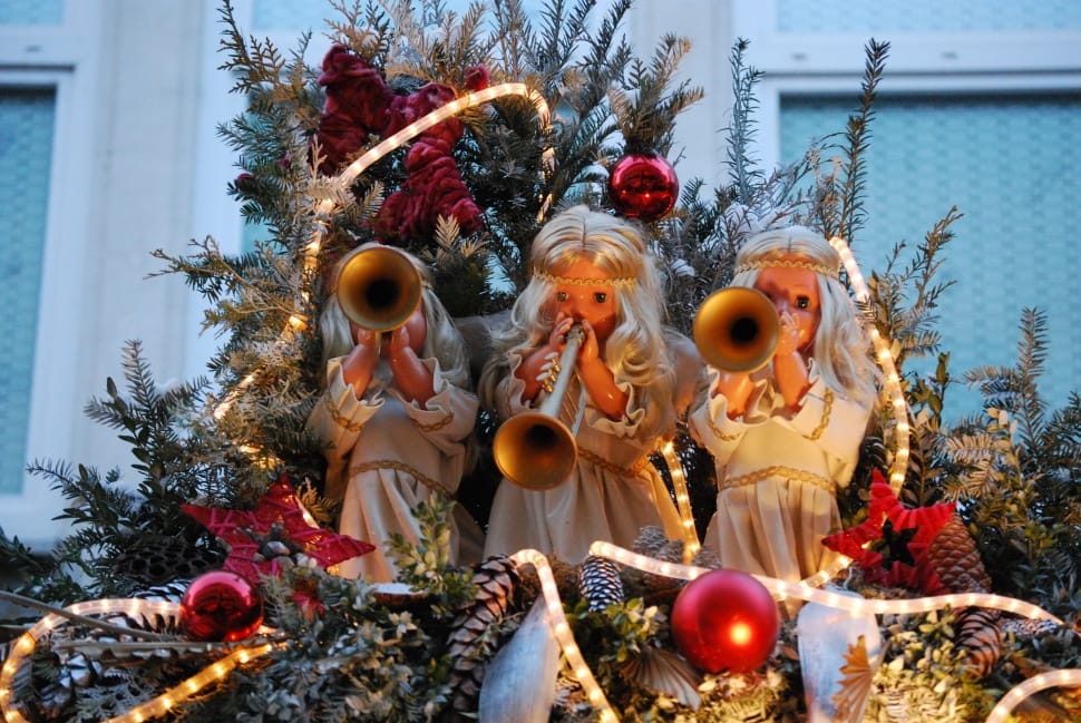 3 girl on white dress playing flute christmas decor preview