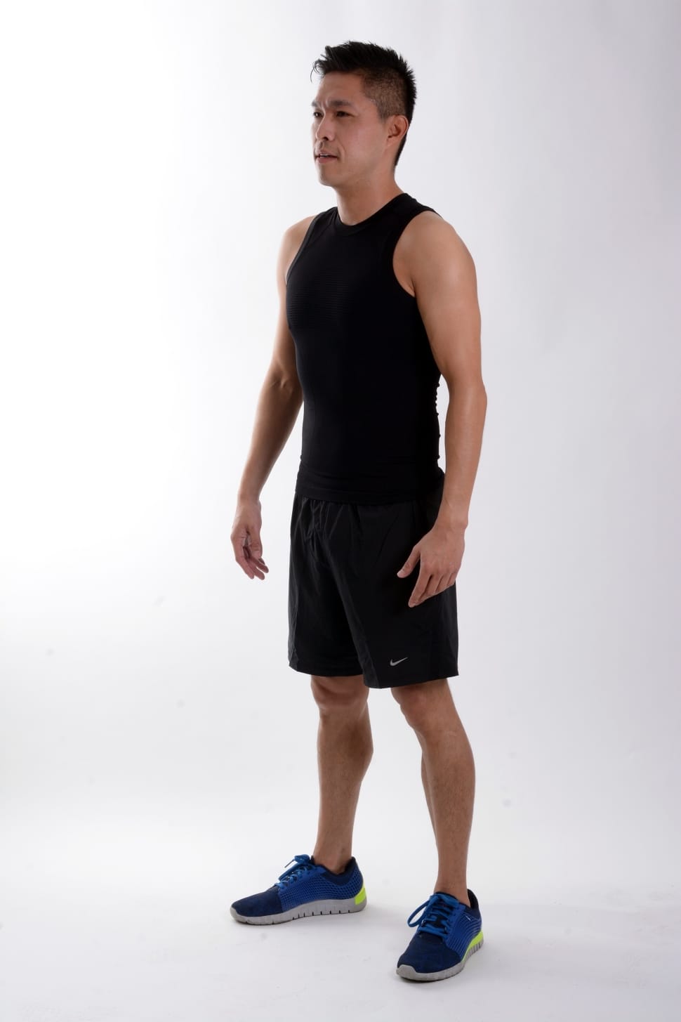 man wearing black tank top and nike short preview